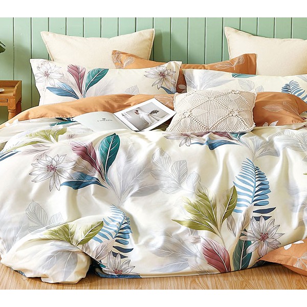 Постельное белье из светло-лимонного поплина с разменоцветными листьями и оранжевым компаньоном